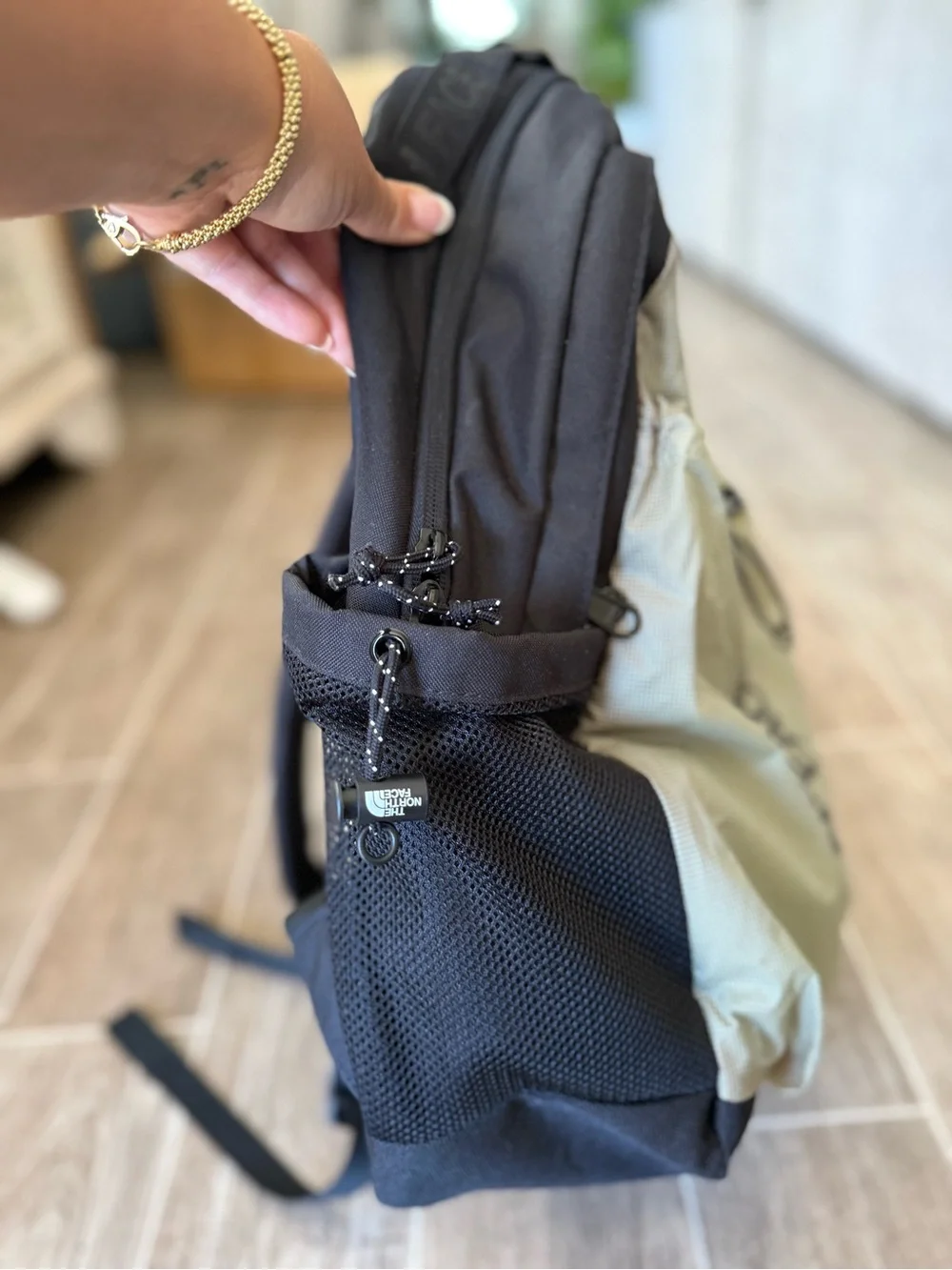 The North Face Bozer III backpack in black/green